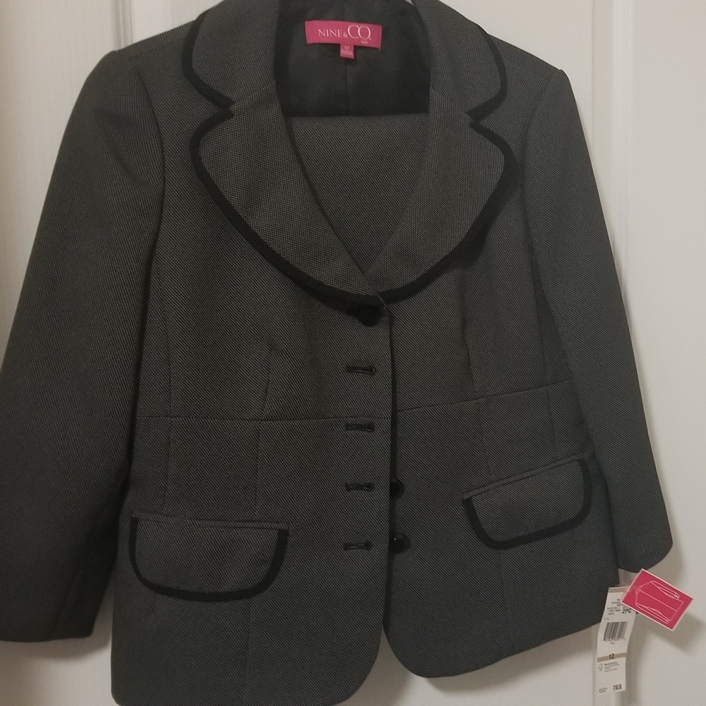 Two piece skirt suit